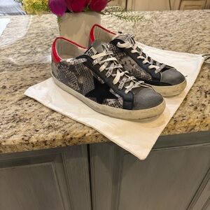 Golden Goose Superstar Sneakers with Red and Black Accents